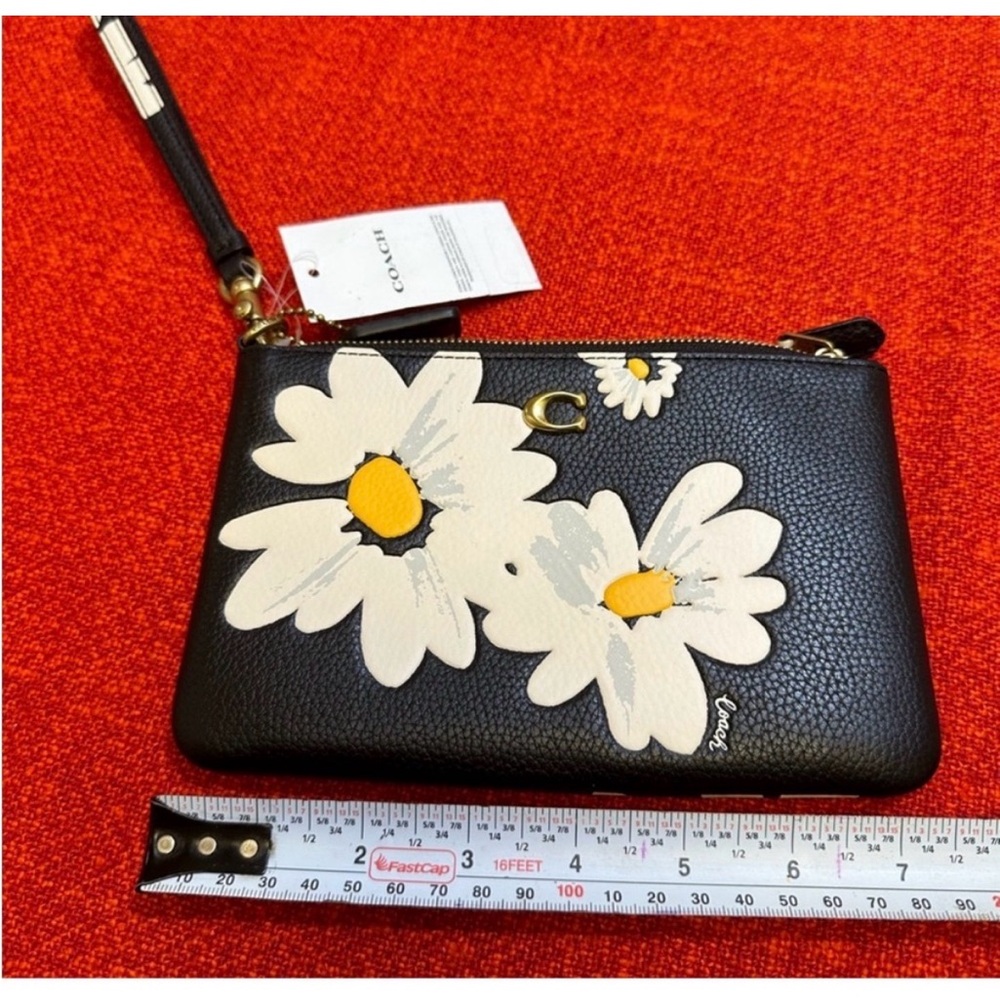 Coach Black Wristlet with White Daisy Design - Picture 2 of 6